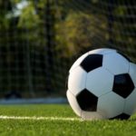 soccer ball in front of goal on 5 meter line